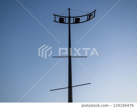 Street lamp design. Modern street lights are off. There is no electricity. Street lamp design. Modern street lights are off. There is no electricity. 129180476