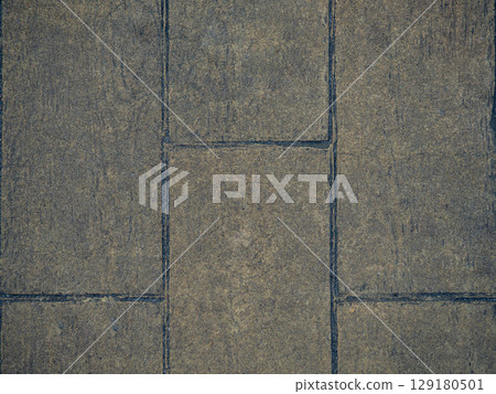 Tile background. Brown masonry. Repair work. 129180501