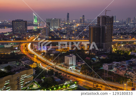 Skyline view of Bangkok business district at sunset. 129180833