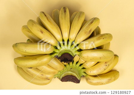 Mini Bananas Cluster with Natural Texture and Detail. Mini Bananas Cluster with Natural Texture and Detail. 129180927