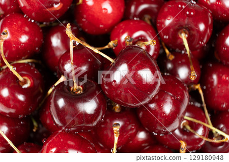 Macro View of Washed Sweet Cherries with Water Drops. Macro View of Washed Sweet Cherries with Water Drops. 129180948
