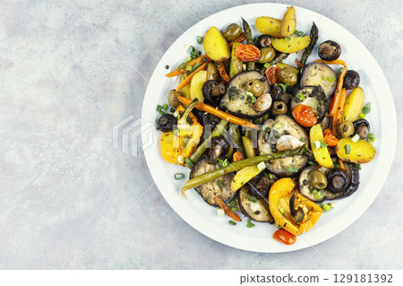 Baked vegetables mix. 129181392