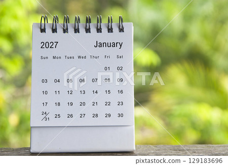 January 2027 calendar with blurred nature background. Copy space 129183696