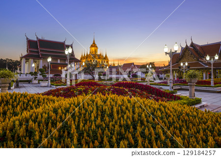 Beautiful sky and Wat Ratchanatdaram Temple in Bangkok, Thailand. Thai architecture: Wat Ratchanadda, Loha Prasat and Traditional Thai pavilion is among the best of Thailand's landmarks. Beautiful sky and Wat Ratchanatdaram Temple in Bangkok, Thailand. Thai architecture: Wat Ratchanadda, Loha Prasat and Traditional Thai pavilion is among the best of Thailand's landmarks. 129184257