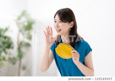 A woman with a wallet A woman with a wallet 129185057