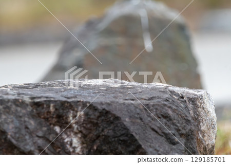 Smooth textured rock and soft background 129185701