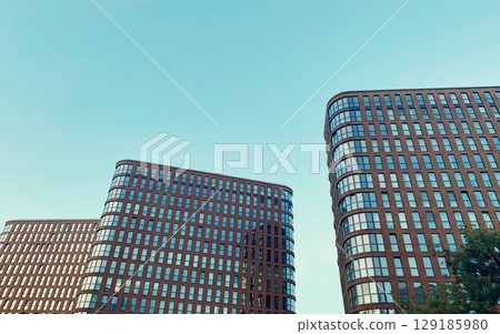 Architecture and real estate, modern residential apartment building with large panoramic windows 129185980
