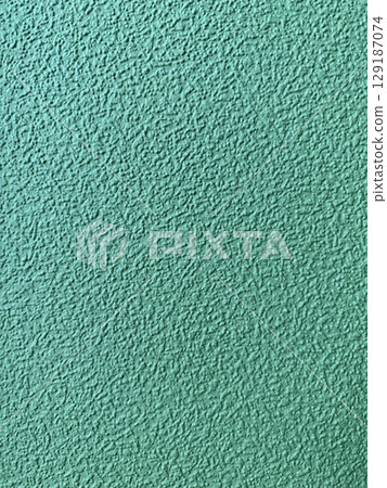 Textured turquoise wall surface suitable for background and design element in creative projects 129187074