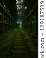 Abandoned factory tracks covered in greenery and a fantastic landscape 129187519
