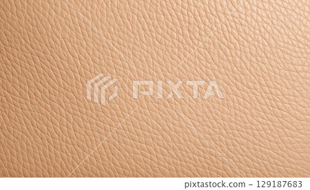 Leather texture close-up. Fashionable background in beige color 129187683