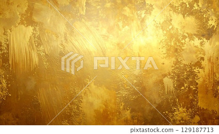 Gold painted concrete wall background 129187713