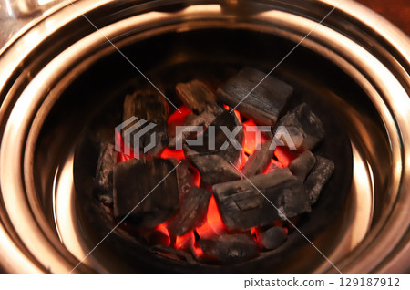 Charcoal for Korean style barbecue Charcoal for Korean style barbecue 129187912