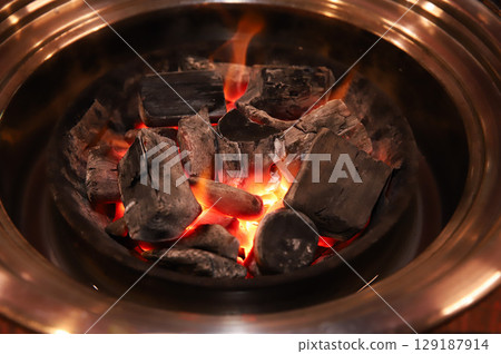 Charcoal for Korean style barbecue Charcoal for Korean style barbecue 129187914