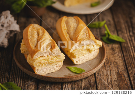 Spanish potato omelette sandwich 129188216
