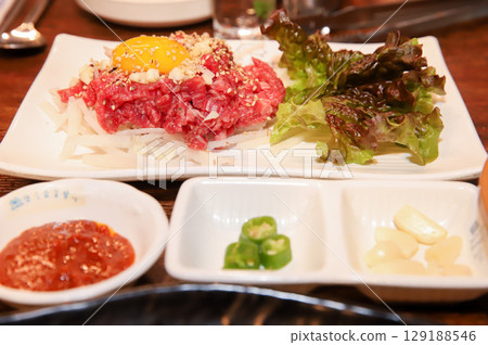 Korean traditional food. Beef raw beef Korean traditional food. Beef raw beef 129188546