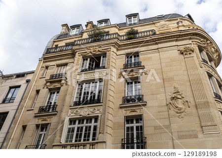 Facade of residential building in Paris, France Facade of residential building in Paris, France 129189198