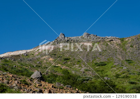 Mount Nasu, Tochigi Prefecture: View of the summit of Mount Chausu from the hiking trail Mount Nasu, Tochigi Prefecture: View of the summit of Mount Chausu from the hiking trail 129190338