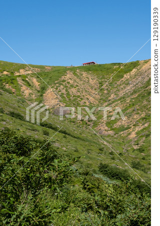 Scenery of the hiking trail and teahouse on the peak of Mount Nasu, Tochigi Prefecture Scenery of the hiking trail and teahouse on the peak of Mount Nasu, Tochigi Prefecture 129190339