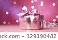Holiday pink background with gift with satin bow. Valentine's Day, Women's Day, Mother's Day, Wedding, Christmas 129190482