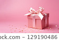 Holiday pink background with gift with satin bow. Valentine's Day, Women's Day, Mother's Day, Wedding, Christmas 129190486