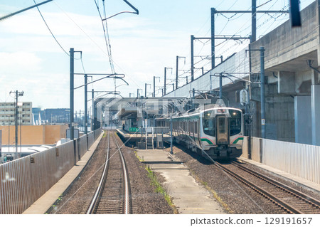 E721 series train departing from Taishido Station, Tohoku Main Line, trackbed 129191657