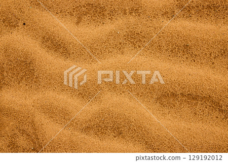 Golden Sand Texture with Natural Wave Patterns Overhead Close Up View 129192012