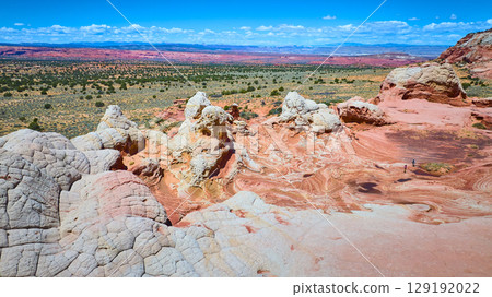 Aerial Over Swirling Sandstone Formations and Desert Plain White Pocket Arizona 129192022