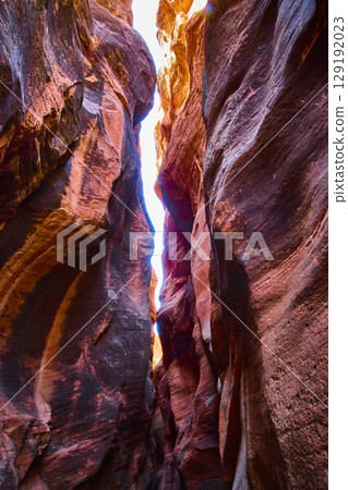 Vivid Sandstone Slot Canyon Walls with Upward Motion Perspective 129192023
