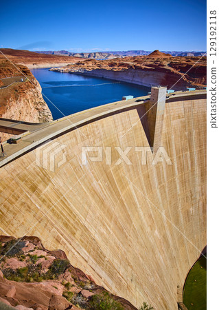 Glen Canyon Dam and Lake Powell with Red Desert Landscape Arizona Elevated Angle Glen Canyon Dam and Lake Powell with Red Desert Landscape Arizona Elevated Angle 129192118