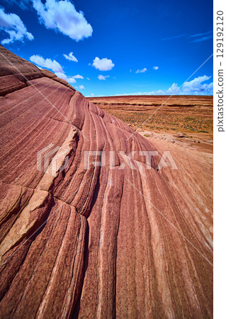 Red Sandstone Striations and Desert Plateau under Blue Sky Beehive Trail Arizona Red Sandstone Striations and Desert Plateau under Blue Sky Beehive Trail Arizona 129192120