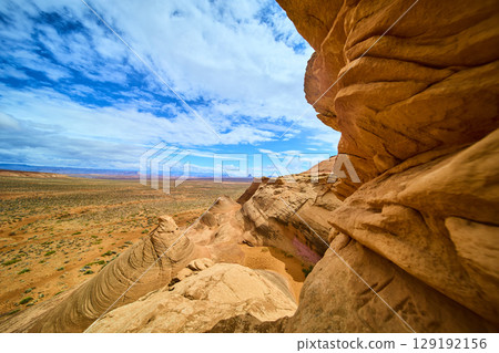 Sandstone Cliffs and Rock Spires in Desert Amphitheater Dramatic Sky Eye Level 129192156