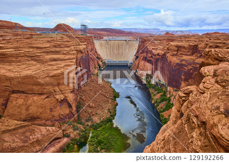 Glen Canyon Dam Colorado River Red Rock Cliffs Aerial Fly Through 129192266
