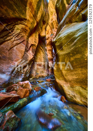 Kanarra Falls Slot Canyon Flowing Stream Ground Level Perspective Kanarra Falls Slot Canyon Flowing Stream Ground Level Perspective 129192379
