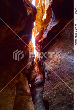 Sandstone Curves and Light in Kanarra Slot Canyon Ground Upward Motion 129192508