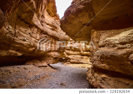 Stratified Rock Canyon in Warm Earth Tones Eye-Level View Stratified Rock Canyon in Warm Earth Tones Eye-Level View 129192634