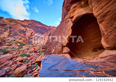 Red Rock Canyon Desert Cave and Rugged Terrain Low Angle View Red Rock Canyon Desert Cave and Rugged Terrain Low Angle View 129192642