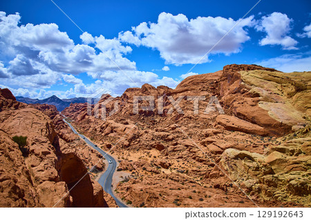 Red Sandstone Formations and Road Adventure in Valley of Fire Aerial Red Sandstone Formations and Road Adventure in Valley of Fire Aerial 129192643