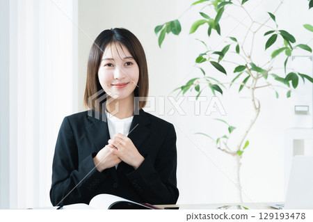 A young woman engaged in sales activities A young woman engaged in sales activities 129193478