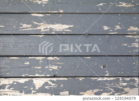 Wooden board with peeling paint Wooden board with peeling paint 129194079