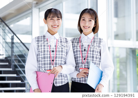 Portrait of a woman wearing a medical office uniform Portrait of a woman wearing a medical office uniform 129194391