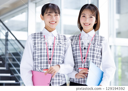 Portrait of a woman wearing a medical office uniform Portrait of a woman wearing a medical office uniform 129194392