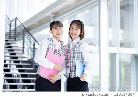 Portrait of a woman wearing a medical office uniform Portrait of a woman wearing a medical office uniform 129194394