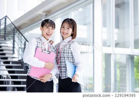 Portrait of a woman wearing a medical office uniform 129194395