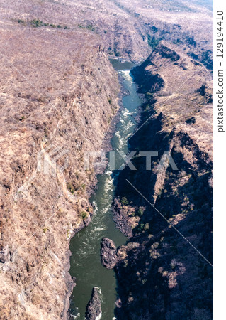 Aerial shot of the down stream gorges of the Zambezi river Aerial shot of the down stream gorges of the Zambezi river 129194410