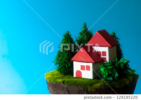 A house on a cliff with a horrifying blue sky 129195220