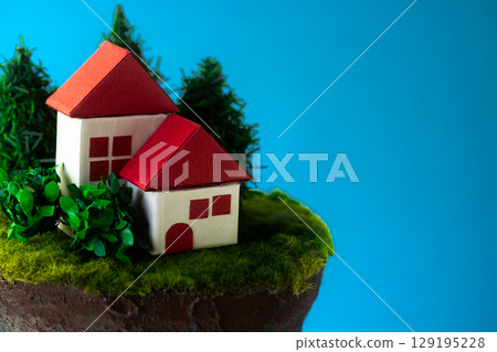 A house on a cliff with a horrifying blue sky 129195228