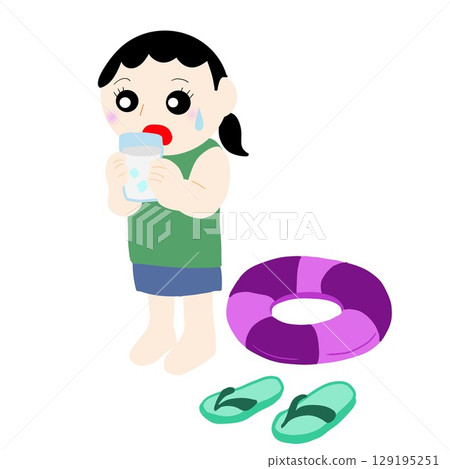 Sandals and swim rings lined up by the pool 129195251