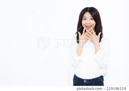 A woman smiling and surprised A woman smiling and surprised 129196129