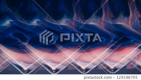 Angle pattern. Color ink wave. Defocused blue pink neon sparkling pigment wet particles pour on abstract acrylic vivid geometric background. 129196705