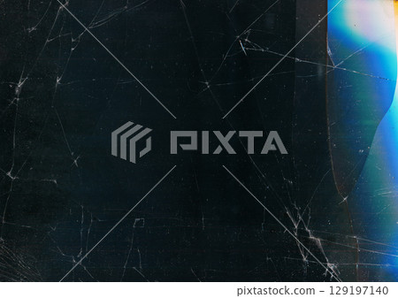 Cracked screen. Glitch glow flare. Fiction damaged scratch defocused black background copy space. Distressed display distortion surface. 129197140